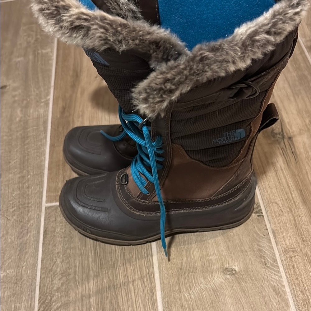 The North Face Brown Winter Boots with Blue Laces